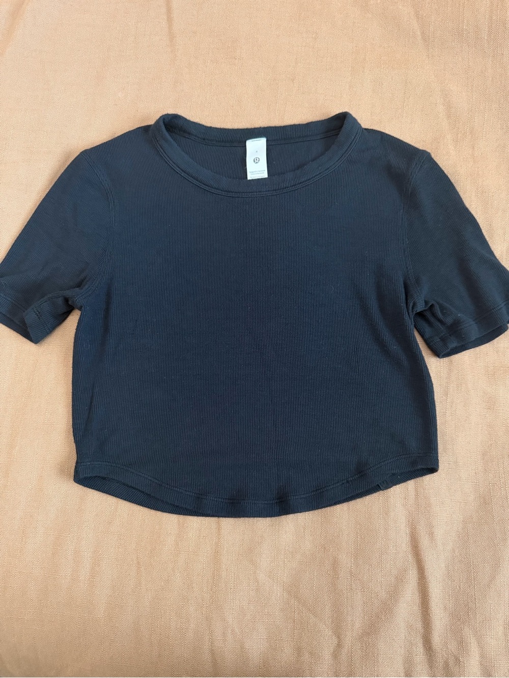 lululemon athletica Black Hold Tight - Cropped with rounded hem. Size 4